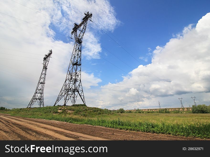 Iron supports for the high-voltage wires. Omsk Region. Russia.
