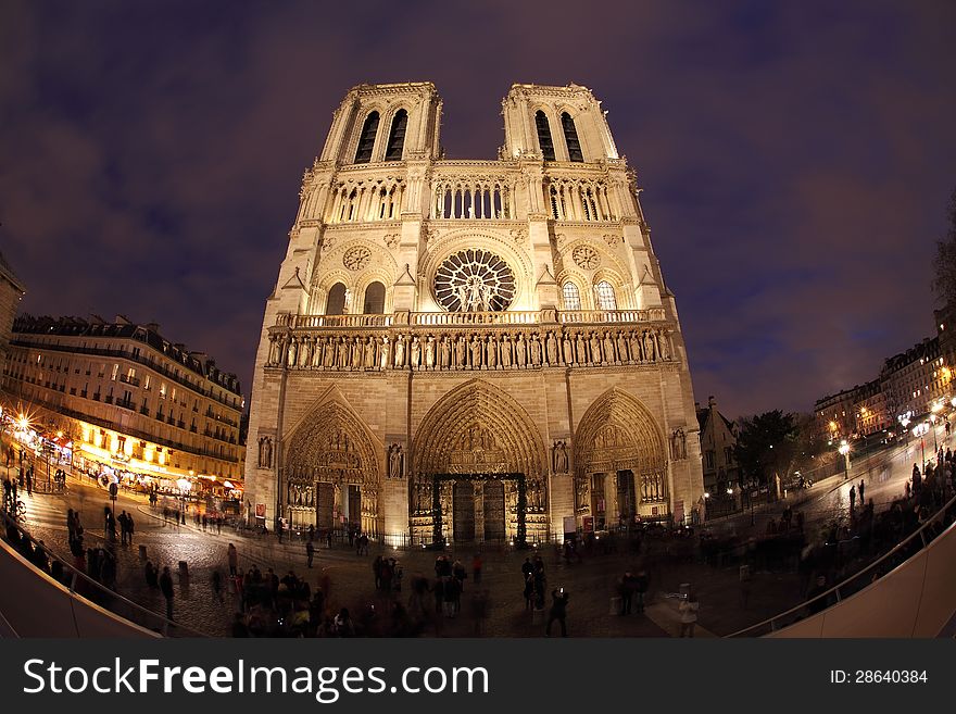 Notre Dame in night with fisheye on Paris