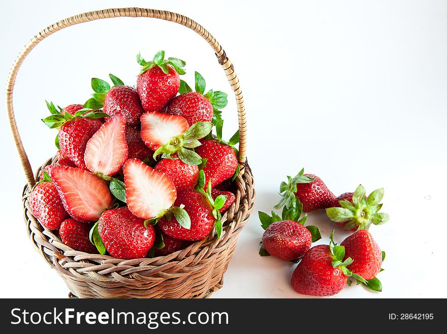 Fresh strawberries in a bamboo basket