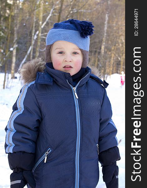 Portrait small boy in winter on mountains. Portrait small boy in winter on mountains