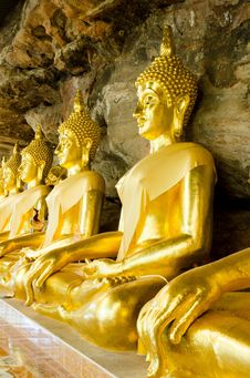 Golden Buddha Statue In Cave Stock Photos Golden Buddha Statue In Cave Stock Photos