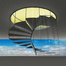 Spiral Staircase With Yellow Flare And Blue Sky View Royalty Free Stock Photography
