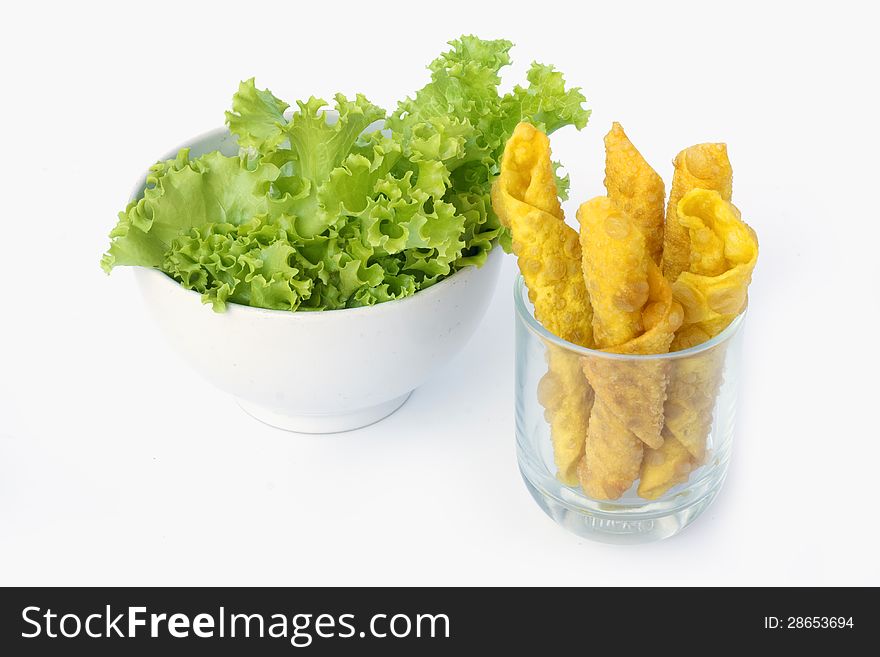 Thai Fried Wonton and salad leaves on white background. Thai Fried Wonton and salad leaves on white background