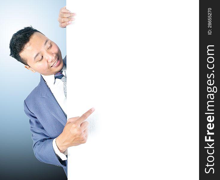 Business man holding white board template