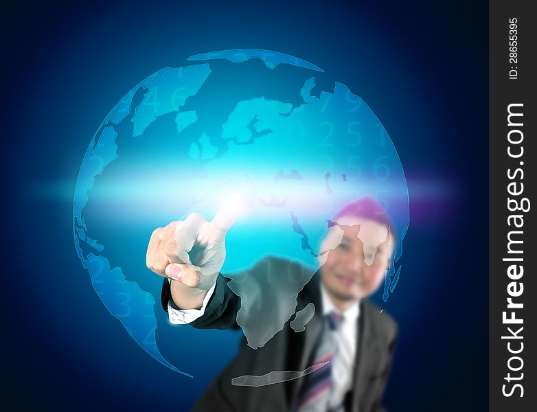 Business man touching the world with light