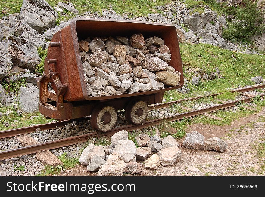 Small wagon in an old abandoned mine. Small wagon in an old abandoned mine