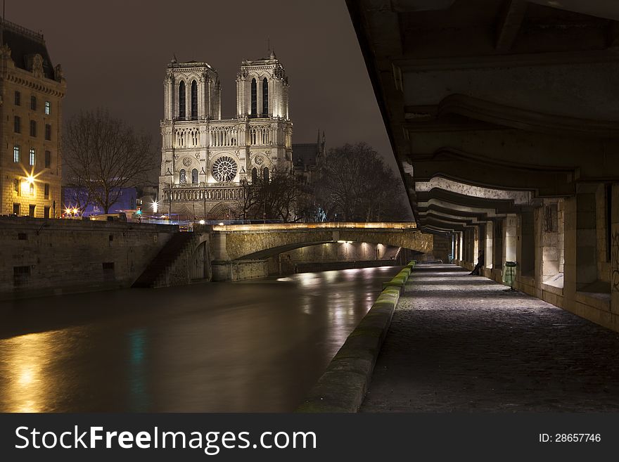 Illuminate Notre-Dame From Paris With Sena In The Night