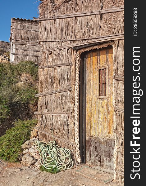 The doors of the old fisherman&#x27;s house on the beach.