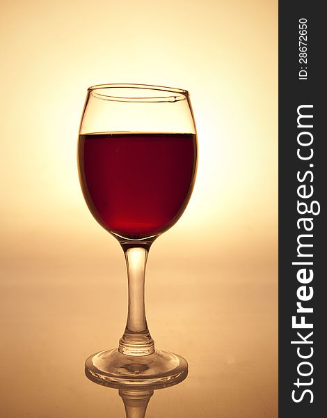 A cup of wine in warm light