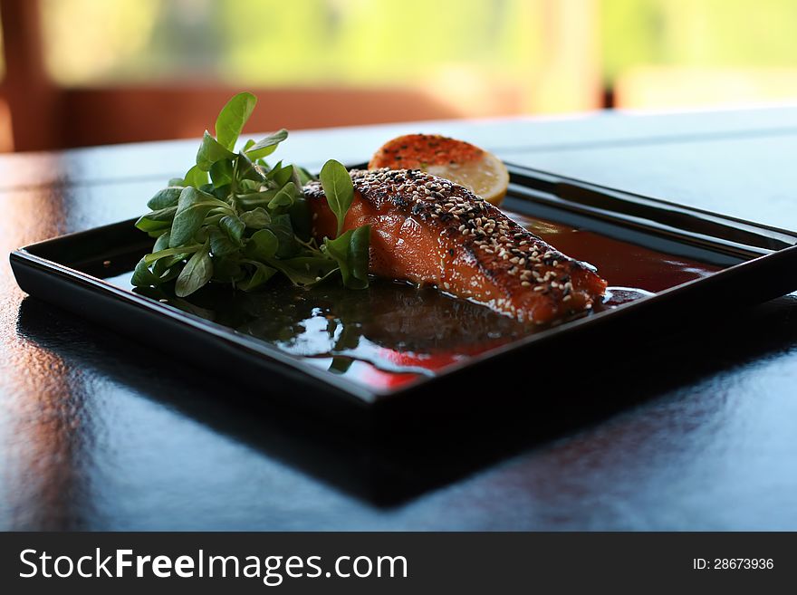 Chinese food on oriental plate.