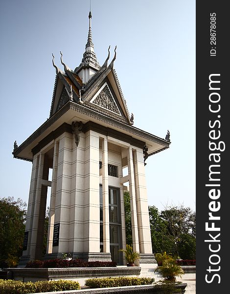 The memorial stupa of the Choeung Ek Killing Fields, containing some of the Khmer Rouge victims' remains. Near Phnom Penh, Cambodia. The memorial stupa of the Choeung Ek Killing Fields, containing some of the Khmer Rouge victims' remains. Near Phnom Penh, Cambodia