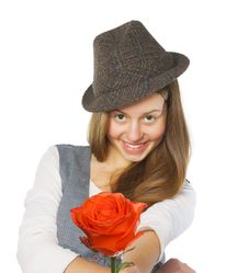 Teen Girl Giving A Rose. Isolated On White Royalty Free Stock Photography