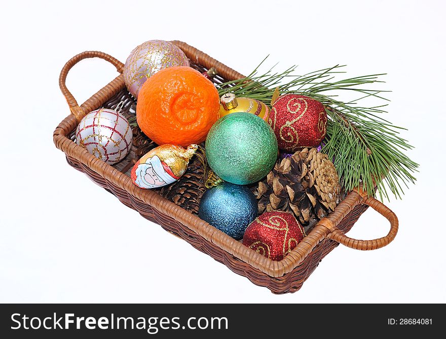 Various Christmas attributes collected in one basket. Various Christmas attributes collected in one basket