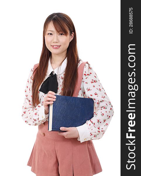 Young asian woman holding a book