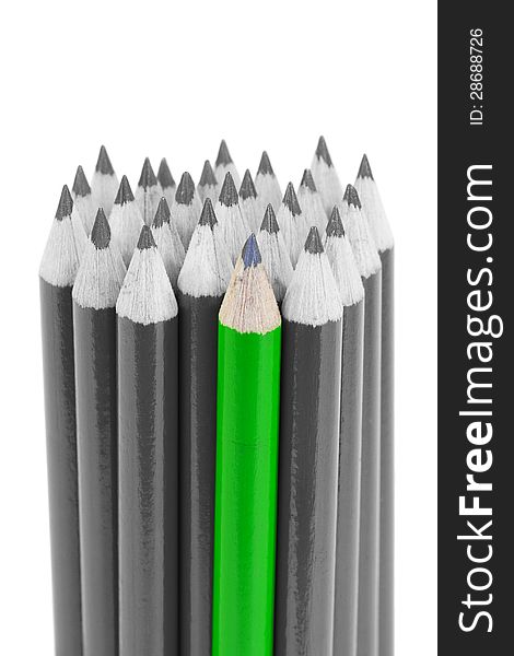 One green pencil and a group of gray on a white background