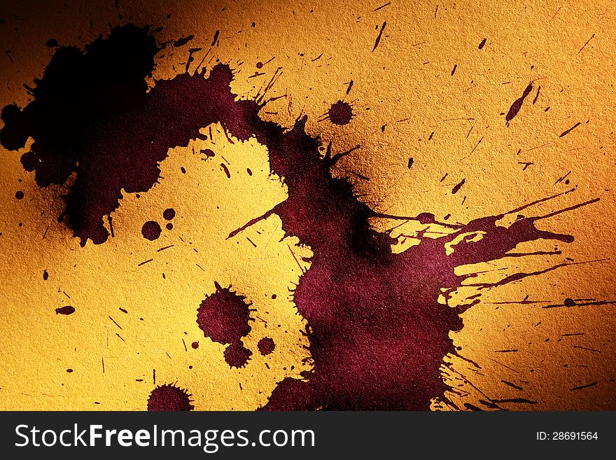Abstract background with inkblots on old yellow paper surface. Abstract background with inkblots on old yellow paper surface