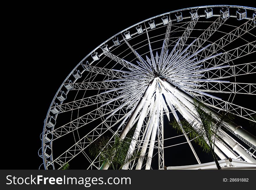 Ferris wheel at night in market thailand