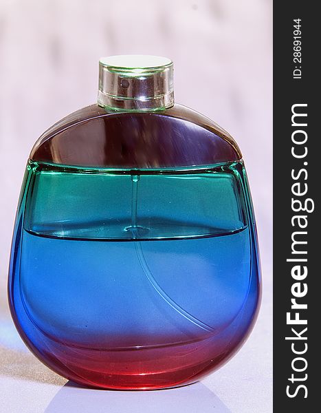 Perfume on  background with reflection