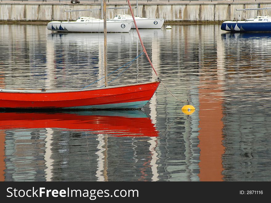 Red sailboat in London dock, UK. Red sailboat in London dock, UK