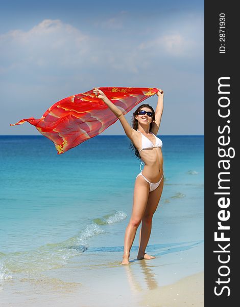 Beauty Girl in white swim suite and red pareo