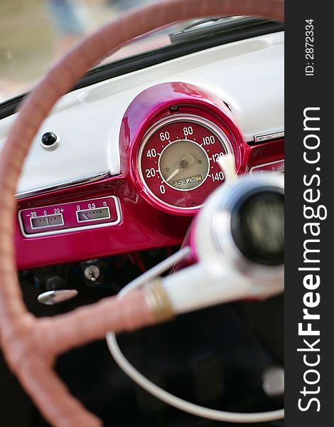 View of the interior of an old vintage car. View of the interior of an old vintage car