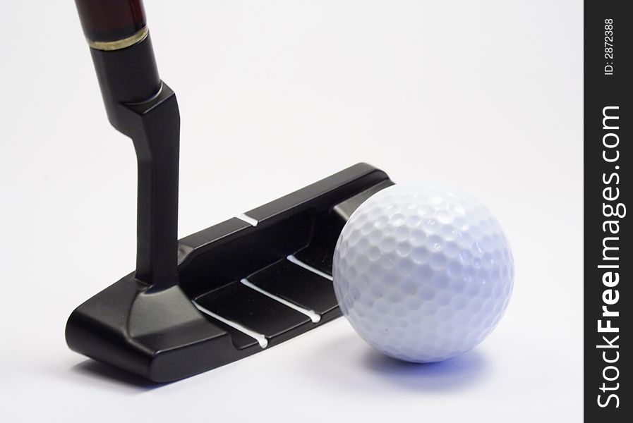 Stick and ball for a golf. Objects on white
