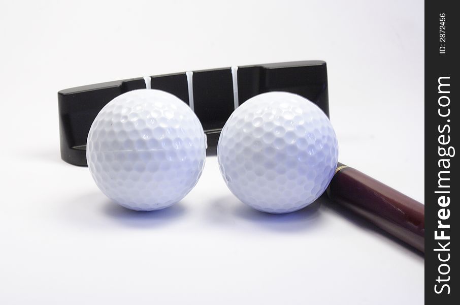 Stick and ball for a golf. Objects on white
