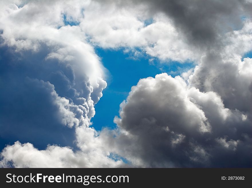 Large cumulus clouds in the blue sky. Large cumulus clouds in the blue sky