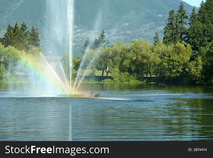 Water fountain in a small lake - Salmon Arm, BC