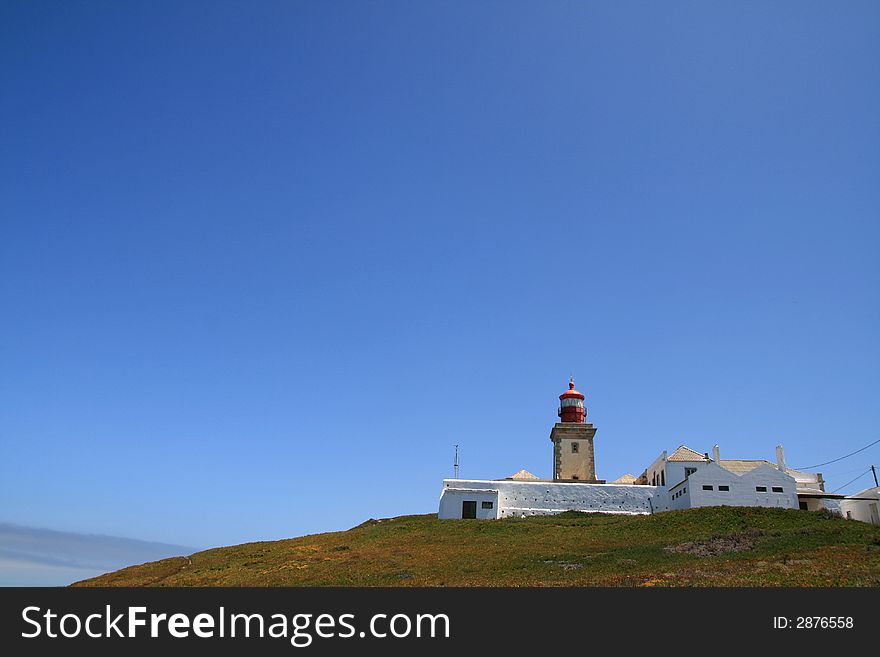 Lonely Lighthouse at the western Cape of Portugal. Lonely Lighthouse at the western Cape of Portugal