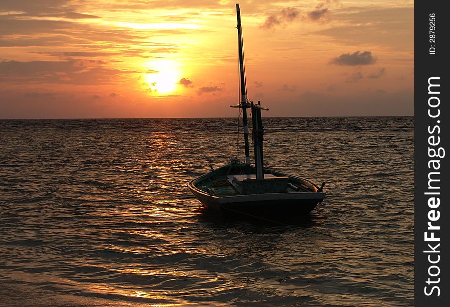 a sunset view from Eydhafushi island of Madlives. a sunset view from Eydhafushi island of Madlives