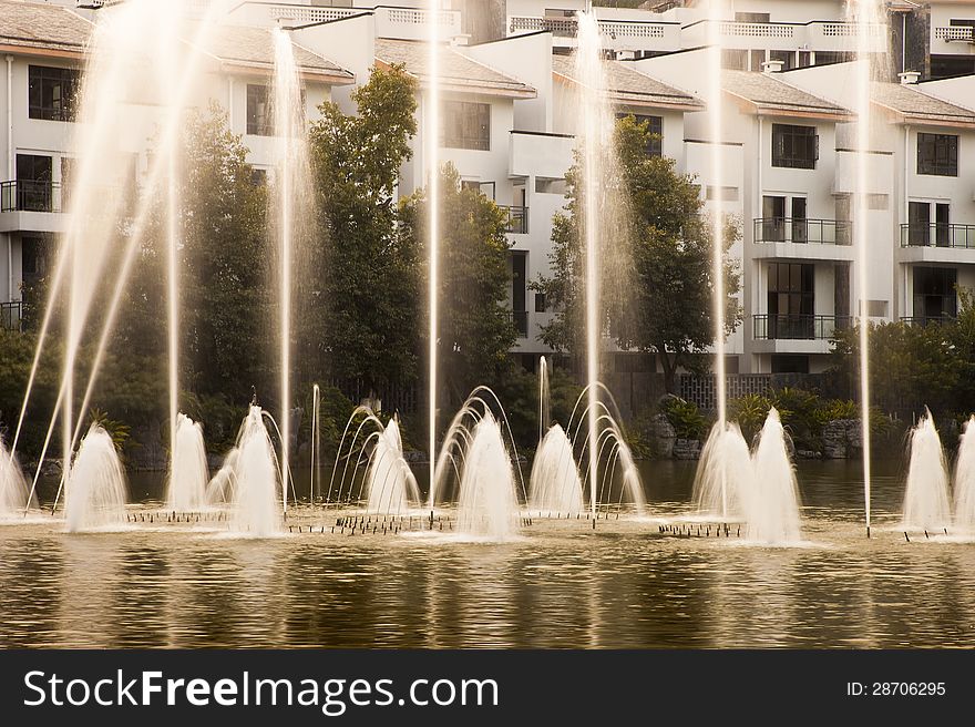 Fountain in lake of modern house