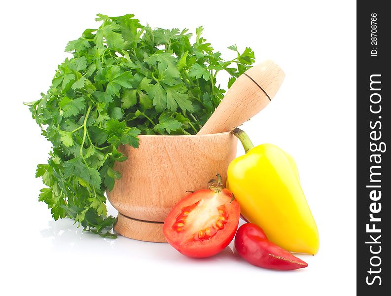 Wooden mortar with parsley, tomato and pepper, food ingredient photo. Wooden mortar with parsley, tomato and pepper, food ingredient photo