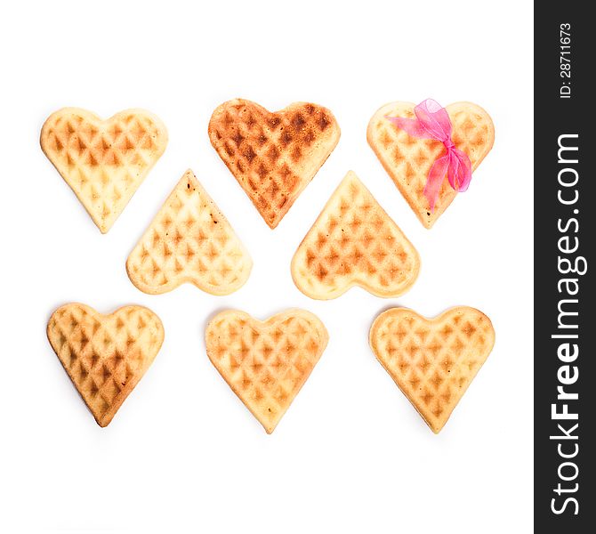 Heart shaped waffles isolated on white background. Heart shaped waffles isolated on white background