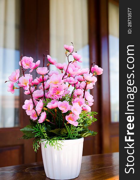 Decorative flowers in the white vase