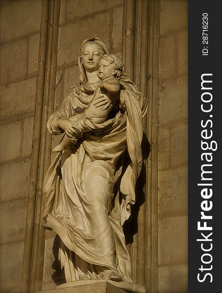 This statue is located inside Notre Dame church in Paris, France. This statue is located inside Notre Dame church in Paris, France.