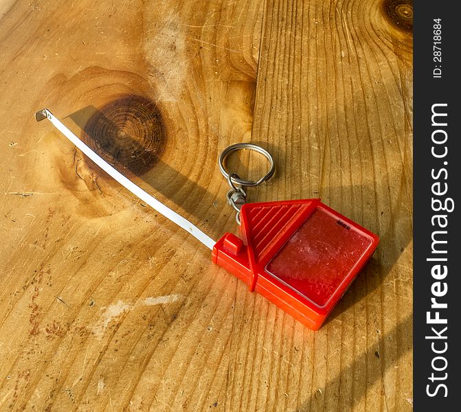 Tape key holder on a wooden table