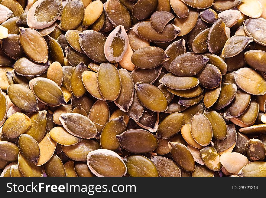 Pumpkin seeds background, vegan food