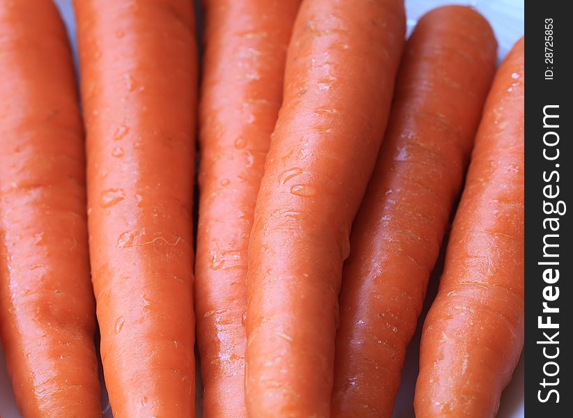 Washed raw carrots ready to cook