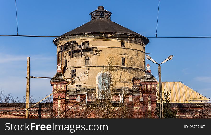 Old devastated locomotive shed with empty shrine in the center, Katowice, Silesia region, Poland. Old devastated locomotive shed with empty shrine in the center, Katowice, Silesia region, Poland