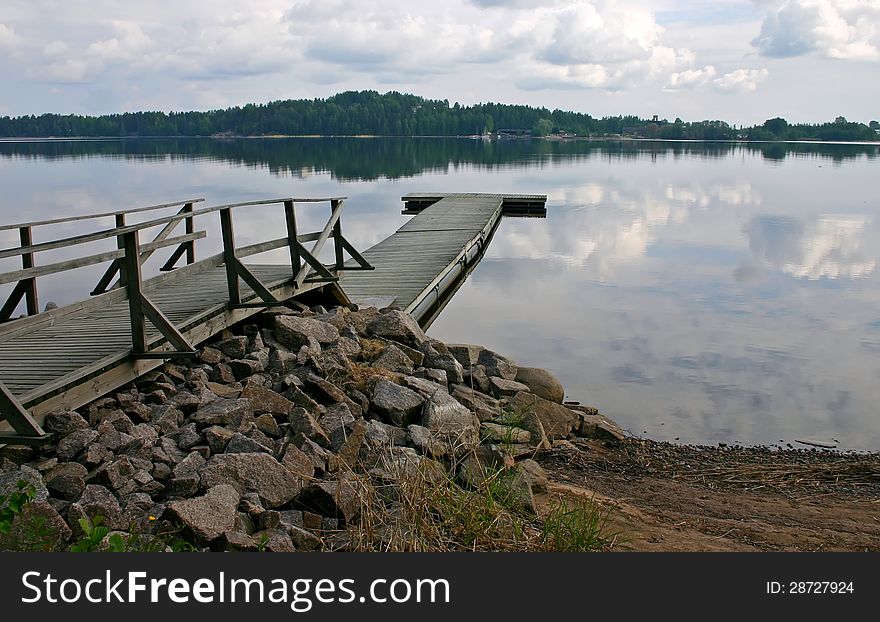Empty dock in calm lake. Empty dock in calm lake