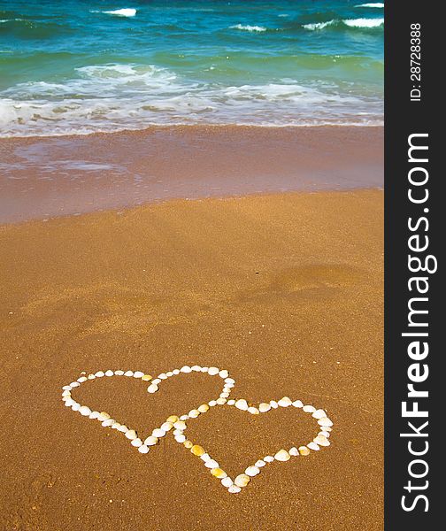 Connected Hearts On Beach - Love Concept