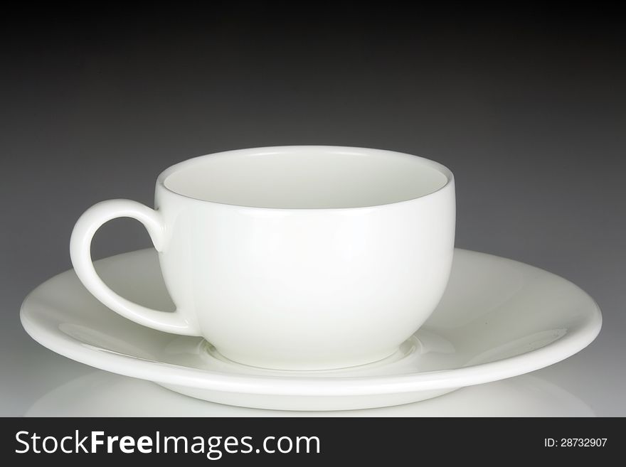 White ceramic cup and saucer