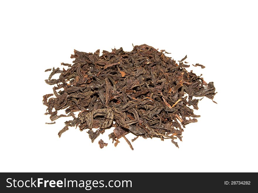 Handful of black tea leaves on white background