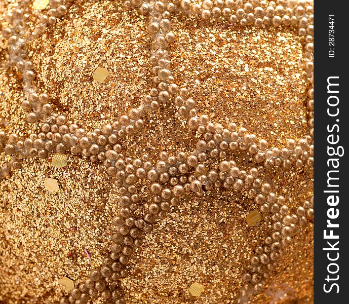 Background of gold beads and sequins