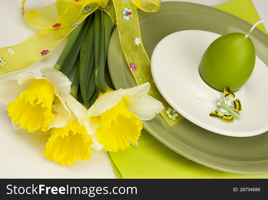 Easter still life with spring flowers and plate for eggs. Easter still life with spring flowers and plate for eggs