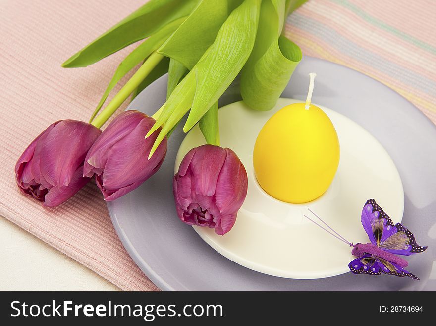Easter still life with spring flowers and plate for eggs. Easter still life with spring flowers and plate for eggs