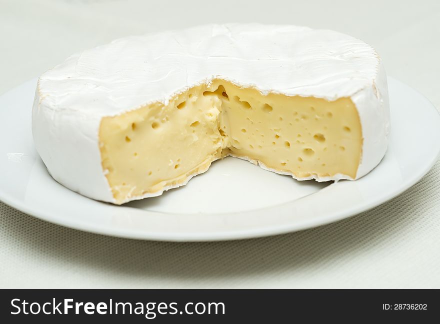 Cheese plate, a kinds of cheese served on a platter. Cheese plate, a kinds of cheese served on a platter.