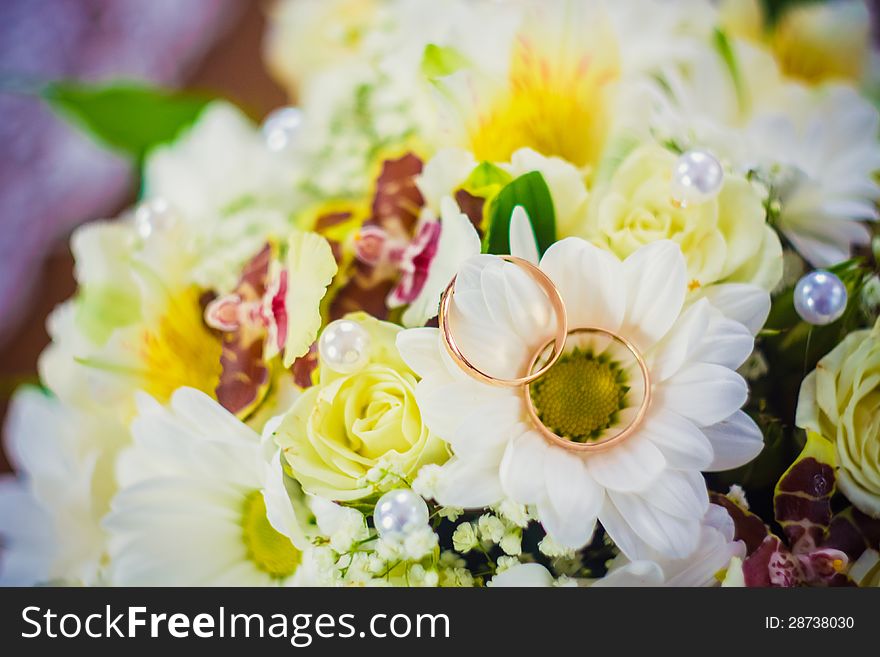 Wedding rings in a gift  flowers. Wedding rings in a gift  flowers