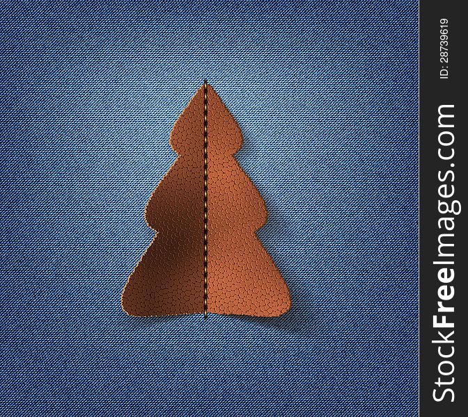 Jeans background with leather Christmas tree.